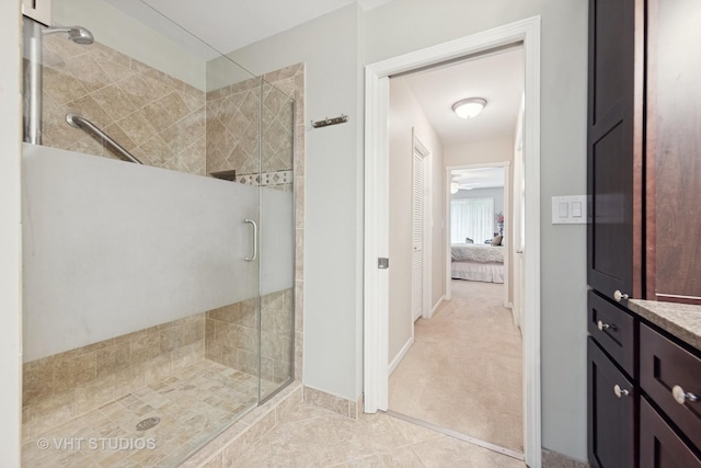 13922 Steepleview Ln, Lemont, IL 60439 - full bath with a shower stall, connected bathroom, vanity, and tile patterned flooring