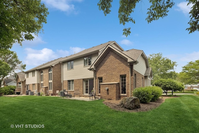 13922 Steepleview Ln, Lemont, IL 60439 - rear view of house featuring brick siding, a yard, and a patio