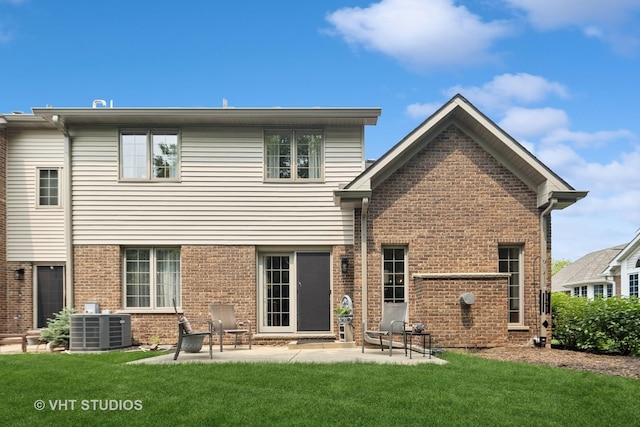 13922 Steepleview Ln, Lemont, IL 60439 - back of property with a patio, a lawn, and brick siding