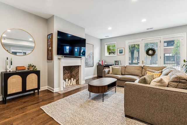 2309 W Chicago Ave Unit 1, Chicago, IL 60622 - living room featuring wood finished floors, a fireplace, baseboards, and recessed lighting