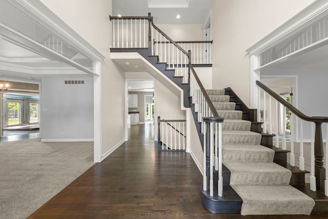 499 Waubonsee Cir, Oswego, IL 60543 - staircase featuring a high ceiling, wood finished floors, baseboards, and recessed lighting