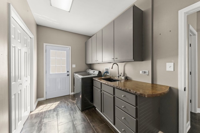 499 Waubonsee Cir, Oswego, IL 60543 - laundry room featuring cabinet space, baseboards, and independent washer and dryer