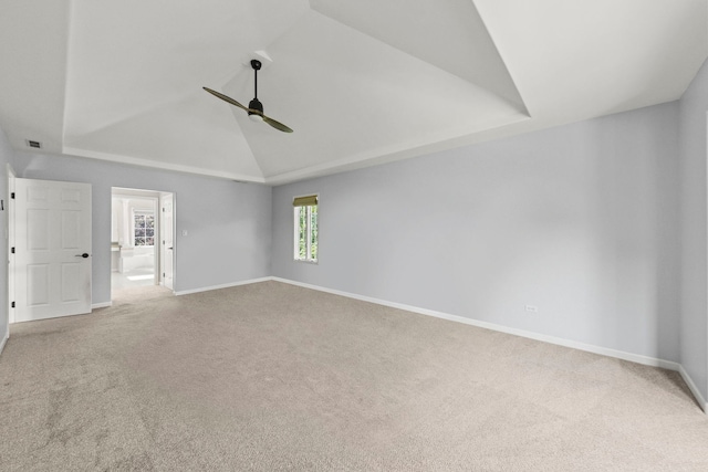 499 Waubonsee Cir, Oswego, IL 60543 - spare room featuring a ceiling fan, carpet floors, baseboards, and high vaulted ceiling