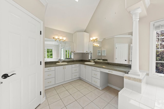 499 Waubonsee Cir, Oswego, IL 60543 - full bathroom with decorative columns, vanity, tile patterned floors, a chandelier, and high vaulted ceiling