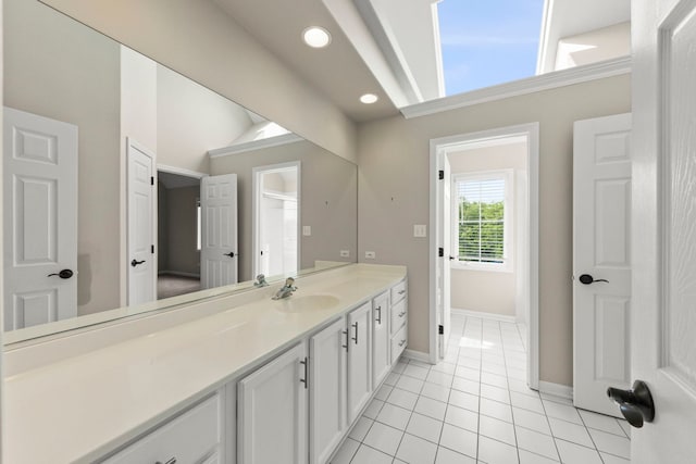 499 Waubonsee Cir, Oswego, IL 60543 - bathroom with vanity, tile patterned floors, baseboards, and recessed lighting