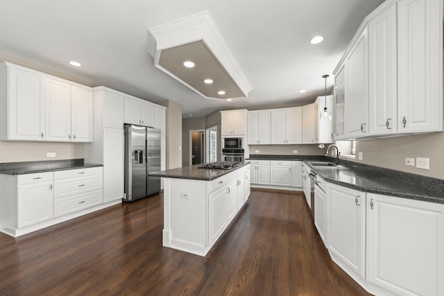 499 Waubonsee Cir, Oswego, IL 60543 - kitchen with stainless steel appliances, a center island, recessed lighting, dark wood-style flooring, and white cabinetry