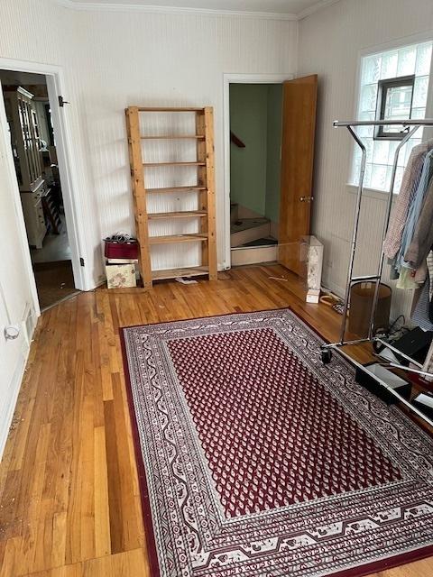 2130 N 74th Ct, Elmwood Park, IL 60707 - bedroom featuring wood finished floors and crown molding