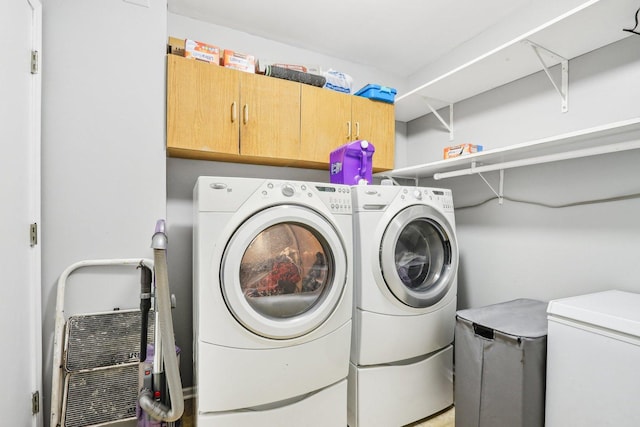 4801 Bordeaux Dr, Lake In The Hills, IL 60156 - laundry room with cabinet space and washer and dryer