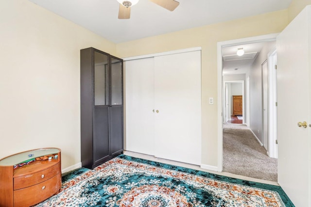 4801 Bordeaux Dr, Lake In The Hills, IL 60156 - bedroom featuring a closet, baseboards, a ceiling fan, and carpet flooring