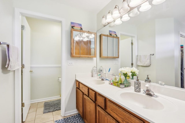 4801 Bordeaux Dr, Lake In The Hills, IL 60156 - bathroom with double vanity, tile patterned flooring, and baseboards