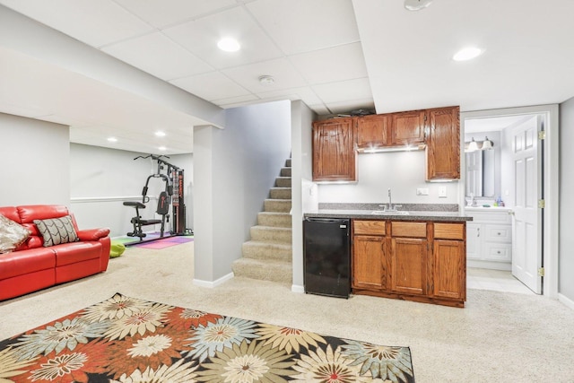 4801 Bordeaux Dr, Lake In The Hills, IL 60156 - kitchen featuring light carpet, baseboards, a sink, recessed lighting, and open floor plan