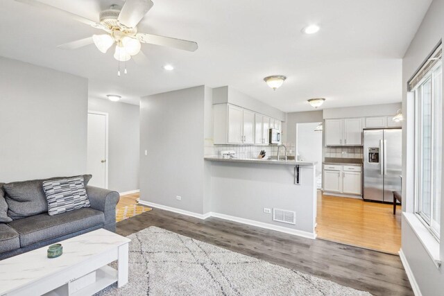 4801 Bordeaux Dr, Lake In The Hills, IL 60156 - living area with wood finished floors, a ceiling fan, recessed lighting, and baseboards