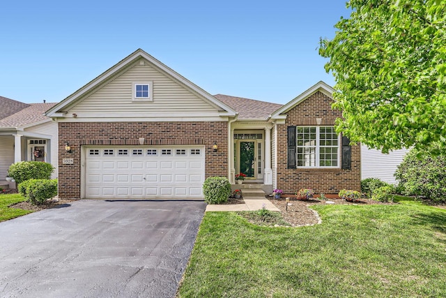 5928 Leeds Rd, Hoffman Estates, IL 60192 - view of front facade with brick siding, driveway, a front yard, an attached garage, and a shingled roof