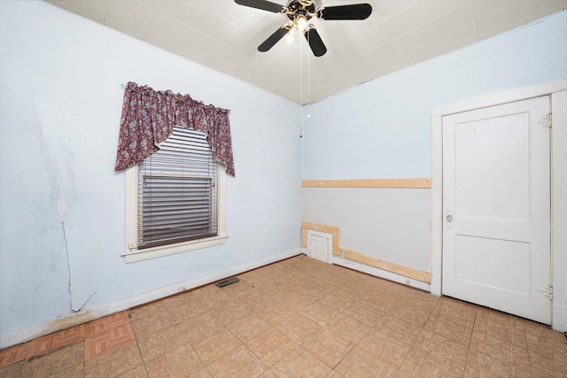3523 W 60th Pl, Chicago, IL 60629 - spare room featuring ceiling fan, tile patterned floors, and baseboards