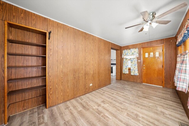 3523 W 60th Pl, Chicago, IL 60629 - foyer entrance featuring ceiling fan, wooden walls, and wood finished floors