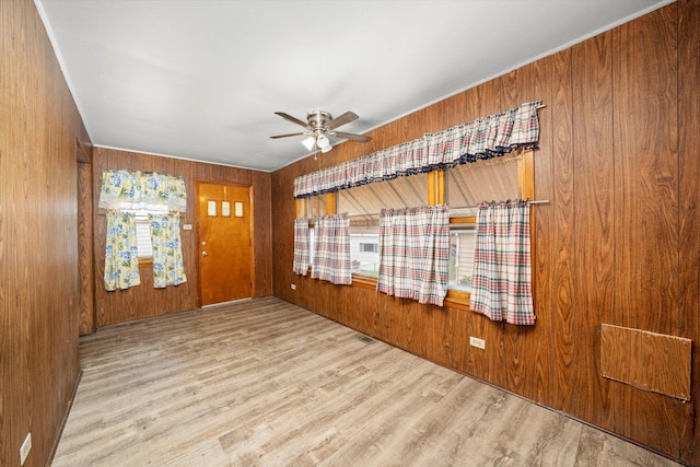 3523 W 60th Pl, Chicago, IL 60629 - foyer with ceiling fan, wood finished floors, and wood walls