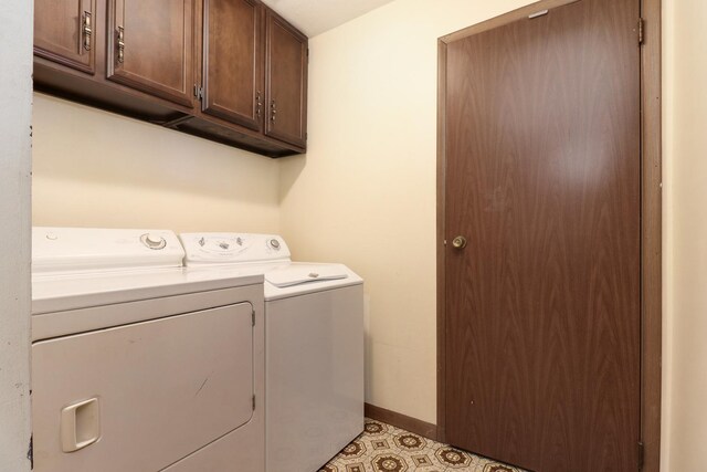 301 Columbia Dr, Normal, IL 61761 - washroom featuring independent washer and dryer and cabinet space