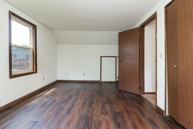 301 Columbia Dr, Normal, IL 61761 - bonus room with dark wood-style flooring and lofted ceiling