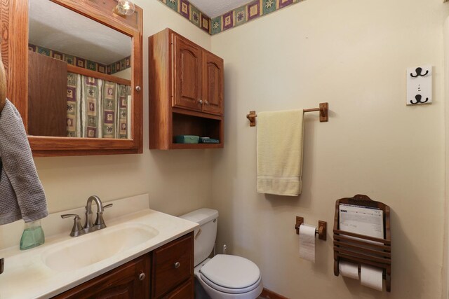 301 Columbia Dr, Normal, IL 61761 - bathroom featuring toilet and vanity