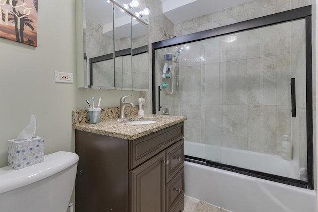 2642 N Windsor Dr Unit 102, Arlington Heights, IL 60004 - bathroom featuring toilet, vanity, and bath / shower combo with glass door