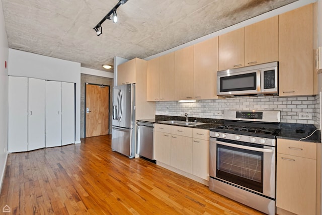 1845 S Michigan Ave Unit 1602, Chicago, IL 60616 - kitchen with appliances with stainless steel finishes, a sink, light wood-type flooring, and light brown cabinetry