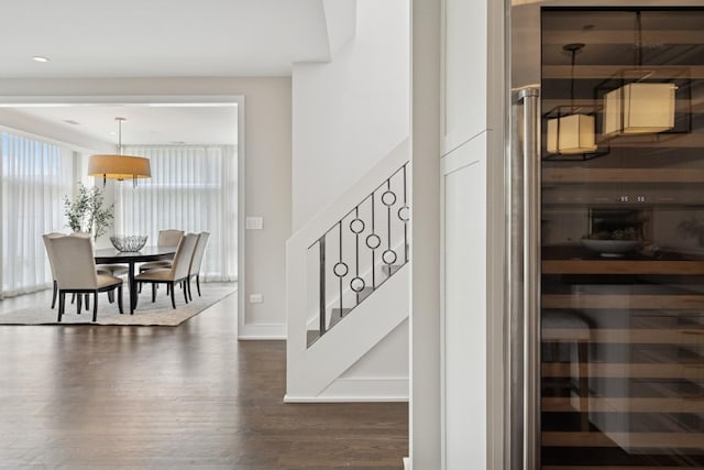 1307 W Wrightwood Ave Unit 201, Chicago, IL 60614 - stairs featuring wood finished floors and baseboards