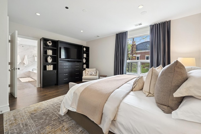 1307 W Wrightwood Ave Unit 201, Chicago, IL 60614 - bedroom featuring dark wood-style floors, recessed lighting, and ensuite bathroom