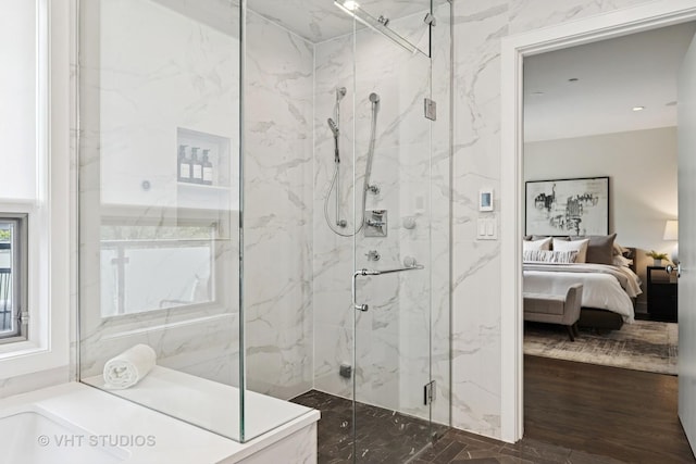 1307 W Wrightwood Ave Unit 201, Chicago, IL 60614 - ensuite bathroom featuring a marble finish shower, wood finished floors, and a bathtub