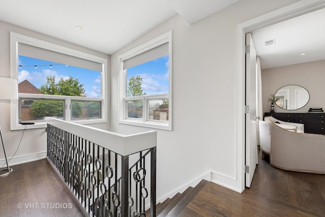 1307 W Wrightwood Ave Unit 201, Chicago, IL 60614 - corridor featuring wood finished floors, healthy amount of natural light, and an upstairs landing