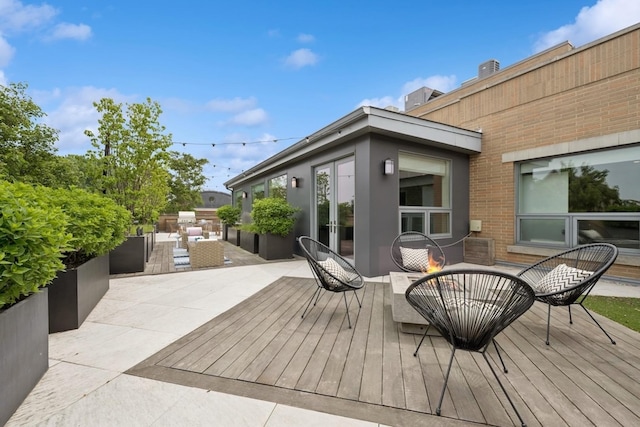 1307 W Wrightwood Ave Unit 201, Chicago, IL 60614 - wooden deck featuring an outdoor living space