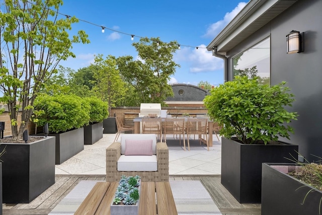 1307 W Wrightwood Ave Unit 201, Chicago, IL 60614 - view of patio with area for grilling and outdoor dining area