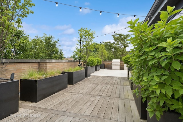 1307 W Wrightwood Ave Unit 201, Chicago, IL 60614 - deck with an outdoor kitchen