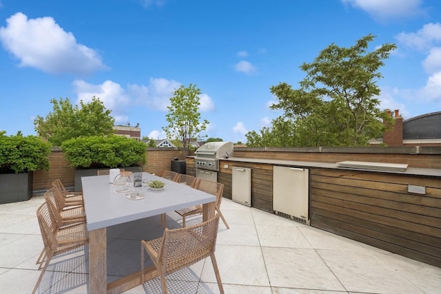 1307 W Wrightwood Ave Unit 201, Chicago, IL 60614 - view of patio / terrace with an outdoor kitchen and outdoor dining space