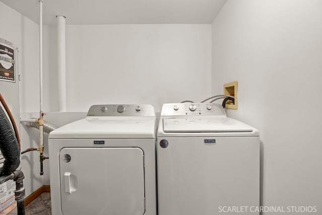 664 Birchwood Dr, Bolingbrook, IL 60490 - washroom featuring washing machine and clothes dryer and baseboards