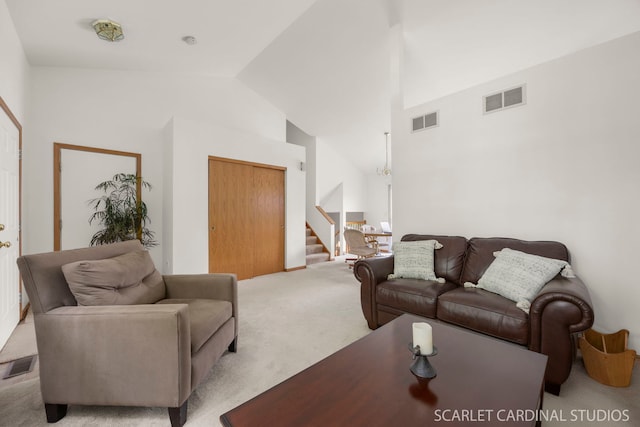 664 Birchwood Dr, Bolingbrook, IL 60490 - carpeted living area with stairs and high vaulted ceiling