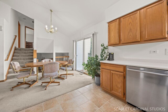 664 Birchwood Dr, Bolingbrook, IL 60490 - kitchen with stainless steel dishwasher, light countertops, vaulted ceiling, a chandelier, and hanging light fixtures