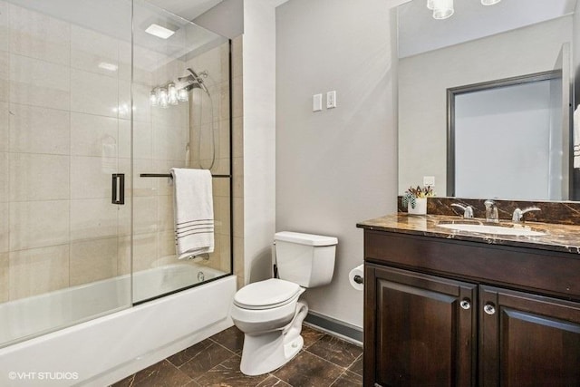 1235 S Prairie Ave Unit 3605, Chicago, IL 60605 - bathroom featuring vanity, toilet, and bath / shower combo with glass door