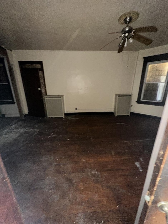 7425 S Harvard Ave, Chicago, IL 60621 - additional living space with ceiling fan and radiator