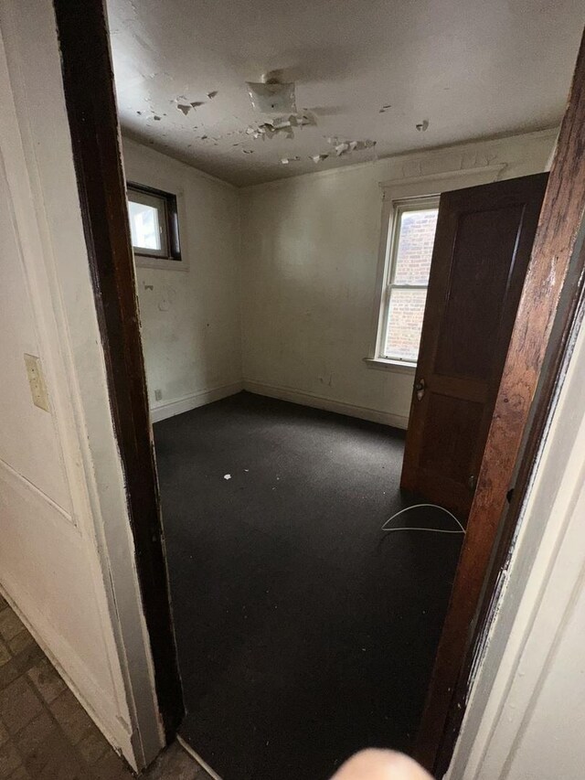 7425 S Harvard Ave, Chicago, IL 60621 - spare room featuring baseboards