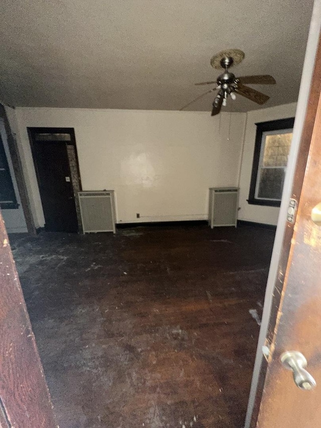 7425 S Harvard Ave, Chicago, IL 60621 - spare room with a ceiling fan