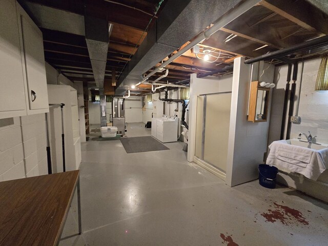 210 S Ridge St, Shannon, IL 61078 - unfinished below grade area featuring independent washer and dryer and heating unit