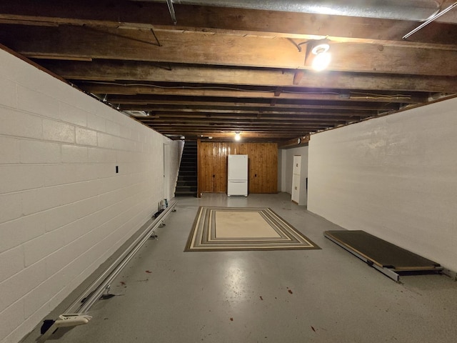 210 S Ridge St, Shannon, IL 61078 - unfinished below grade area with stairway and freestanding refrigerator