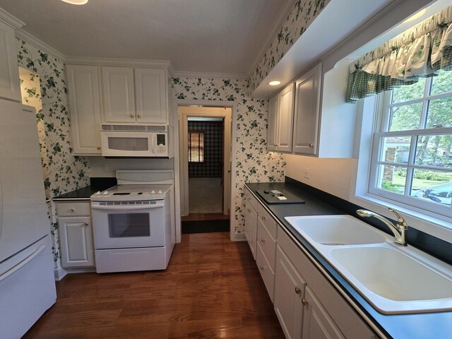 210 S Ridge St, Shannon, IL 61078 - kitchen featuring white appliances, wallpapered walls, a sink, ornamental molding, and dark wood-style floors