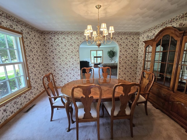 210 S Ridge St, Shannon, IL 61078 - dining room featuring wallpapered walls, a chandelier, and carpet flooring