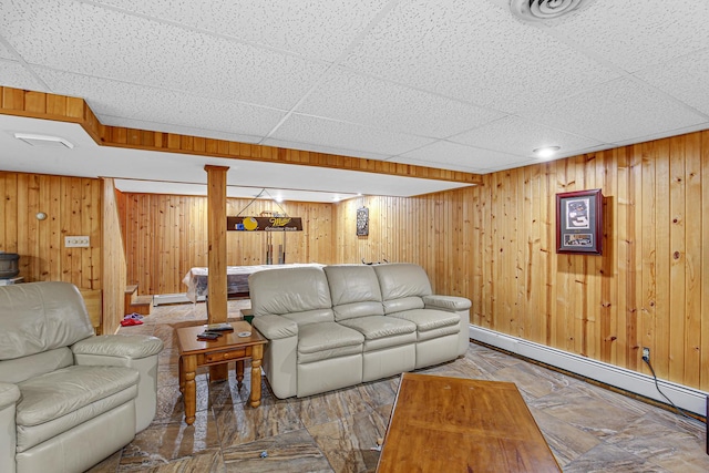 32638 S Lia Ln, Beecher, IL 60401 - living room with wooden walls, baseboard heating, a paneled ceiling, and baseboards