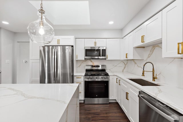7729 W 157th Pl, Orland Park, IL 60462 - kitchen with appliances with stainless steel finishes, a sink, white cabinetry, recessed lighting, and decorative backsplash