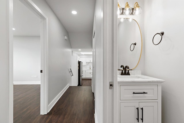 7729 W 157th Pl, Orland Park, IL 60462 - bathroom featuring vanity, wood finished floors, recessed lighting, and baseboards
