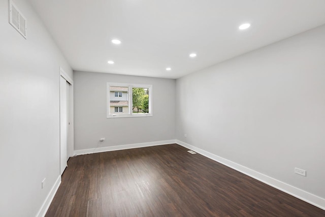 7729 W 157th Pl, Orland Park, IL 60462 - empty room featuring recessed lighting, dark wood finished floors, and baseboards