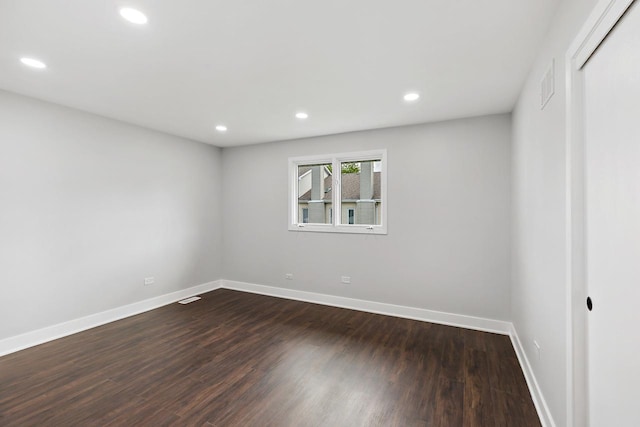 7729 W 157th Pl, Orland Park, IL 60462 - empty room featuring dark wood-type flooring, baseboards, and recessed lighting