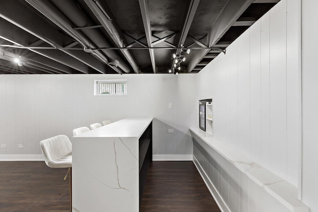 7729 W 157th Pl, Orland Park, IL 60462 - home office featuring baseboards, dark wood-type flooring, and wood walls